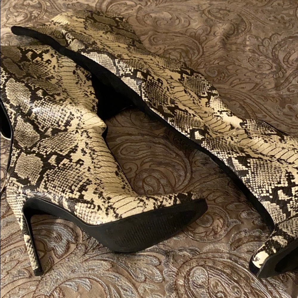 Snake skin reversal thigh high boot heel